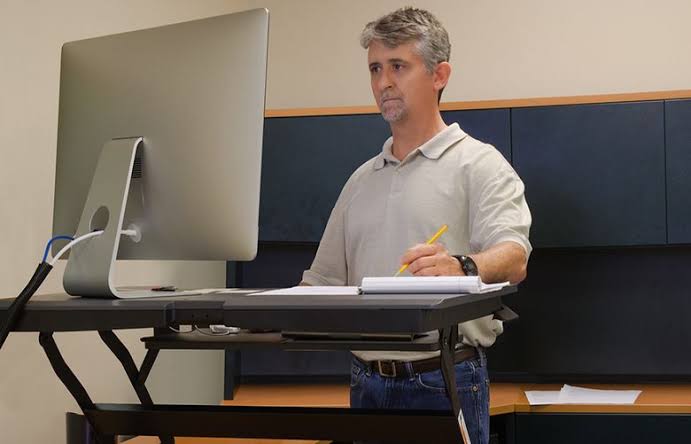 Is Sitting or Standing Better for Productivity at Work? Posture Guide